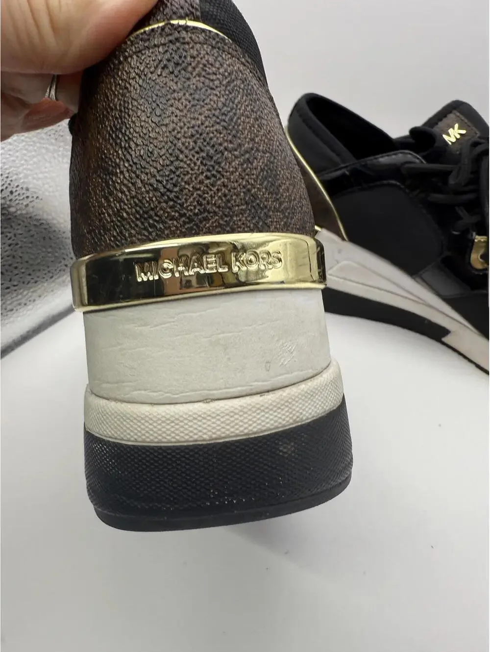 Michael Kors Women's Black and Gold Wedge Sneakers 8.5